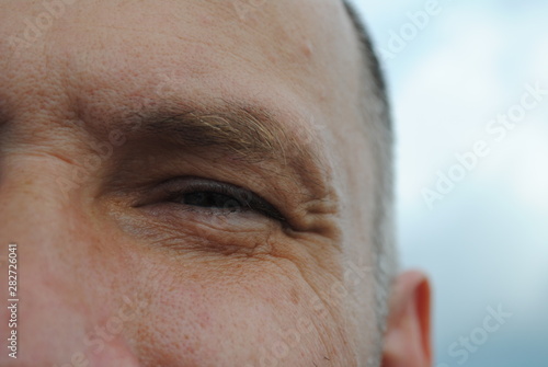 close up of a man looking at camera