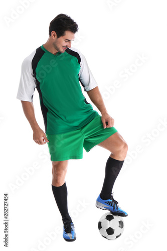 Young football player with ball on white background © New Africa