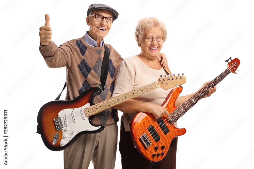 Fototapeta premium Senior man and woman with electric guitars