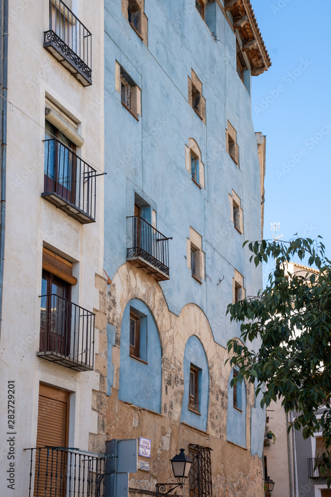 Vertical view of blue house in the historic center of Cuenca, Spain, Europe