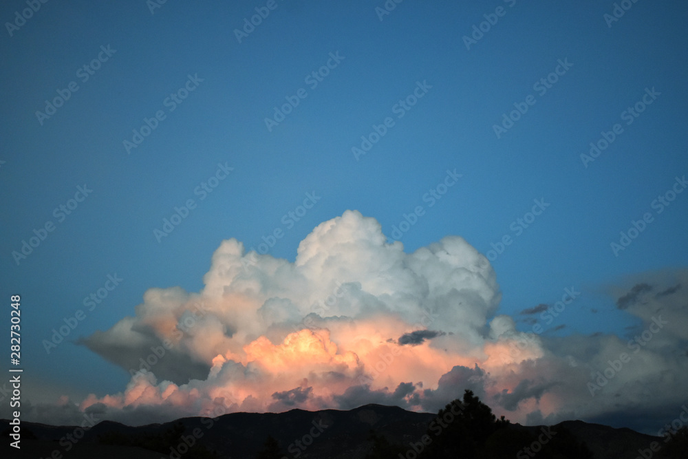 Pretty bright clouds in the sky  high-quality photograph for magazines, blogs, posters, flyers, wall art, cards, business cards, branding, articles, and newspapers.
