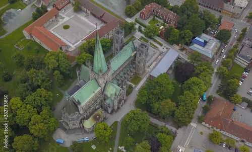 Nidaros Cathedral or Nidarosdomen or Nidaros Domkirke is a Church of Norway cathedral located in the city of Trondheim, Norway. Aerial view from drone. July 2019 photo