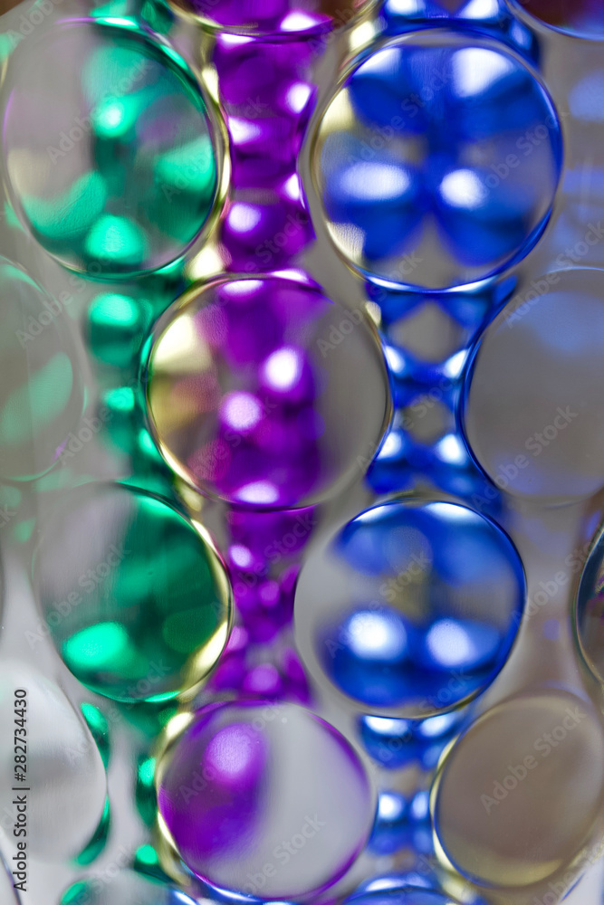 Vibrant macro defocused glass art abstract background with multicolor bokeh Vibrant macro defocused glass art abstract background with multicolor bokeh