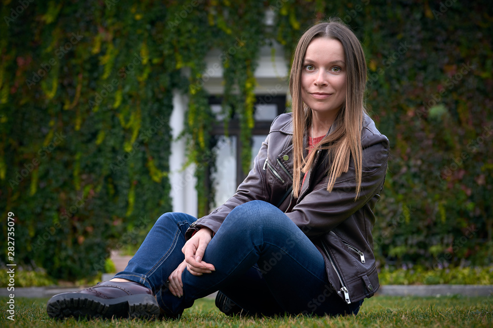 pretty young woman in casual clothes in landscape background pretty young woman in casual clothes in landscape background