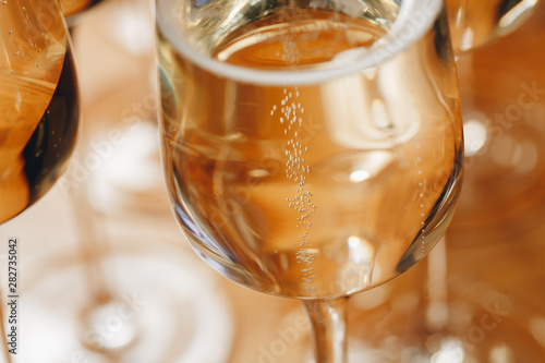 Champagne glasses on table closeup.