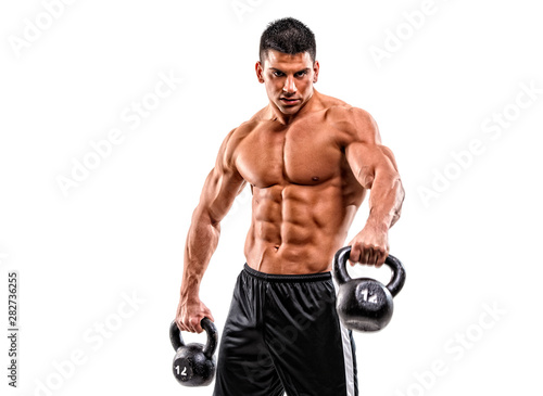 Strong Muscular Men Exercise With Kettlebell
