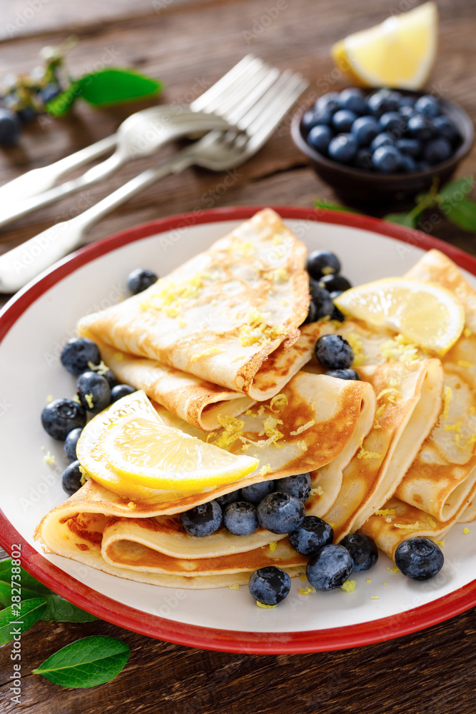 Sweet crepes filled with fresh blueberry Sweet crepes filled with fresh blueberry