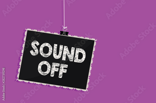 Text sign showing Sound Off. Conceptual photo To not hear any kind of sensation produced by stimulation Hanging blackboard message communication information sign purple background photo