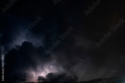 Night clouds thunderstorm, light power in the sky, latin america, long exposure.
