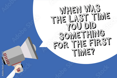 Handwriting text writing When Was The Last Time You Did Something For The First Time question. Concept meaning 0 Man holding megaphone loudspeaker speech bubble message blue background