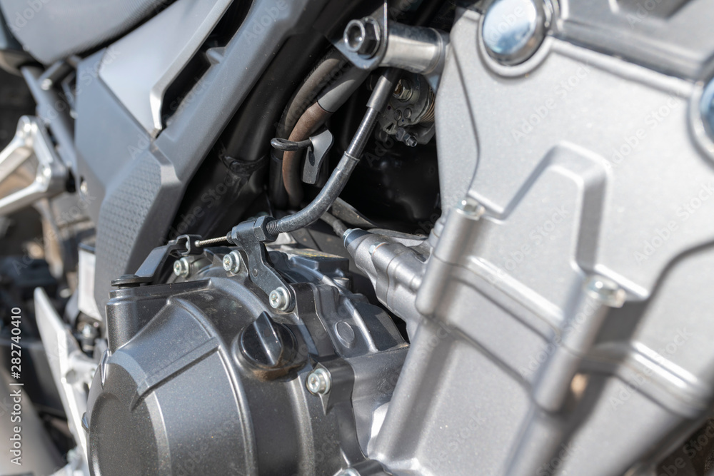 Motorcycle engine detail, clutch cable Motorcycle engine detail, clutch cable