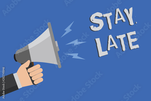 Word writing text Stay Late. Business concept for A routine in which a person goes to somewhere out of time Man holding megaphone loudspeaker blue background message speaking loud photo