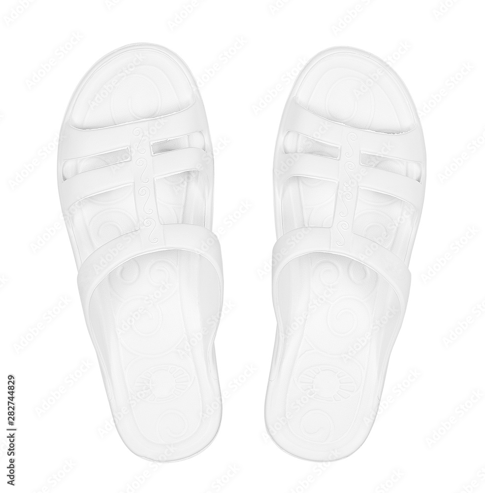 White rubber slippers on the isolated white background White rubber slippers on the isolated white background
