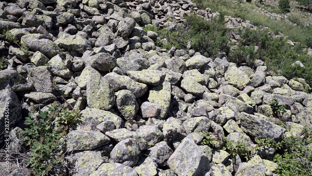 old rocks in nature very old rock fragments with moss old rocks in nature very old rock fragments with moss