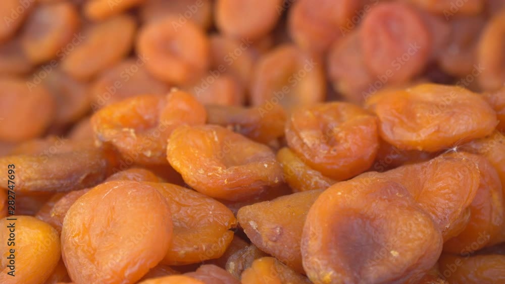 Dried apricots on the counter close-up Dried apricots on the counter close-up