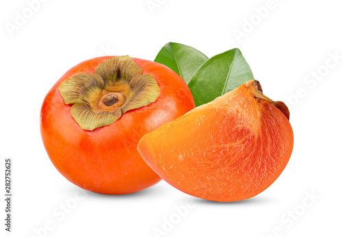 fresh ripe persimmons with leaf isolated on white background. full depth of field photo