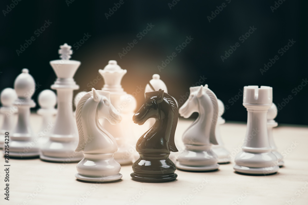 Chess knights head to head.black and white chess battle,Chess victory,chess concept. strategy, management or leadership concept.