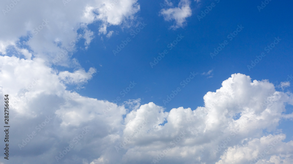 Beautiful bright blue sky with white fluffy clouds on a clear sunny day. Royalty high-quality free stock photo image of blue sky with white cloud, nice weather. Photo of natural cloudscape background Beautiful bright blue sky with white fluffy clouds on a clear sunny day. Royalty high-quality free stock photo image of blue sky with white cloud, nice weather. Photo of natural cloudscape background