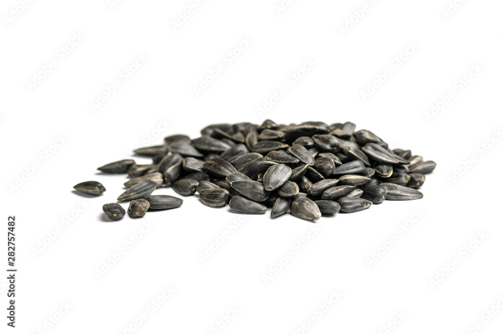 Sunflower seeds, background or texture isolated on white. lose-up.