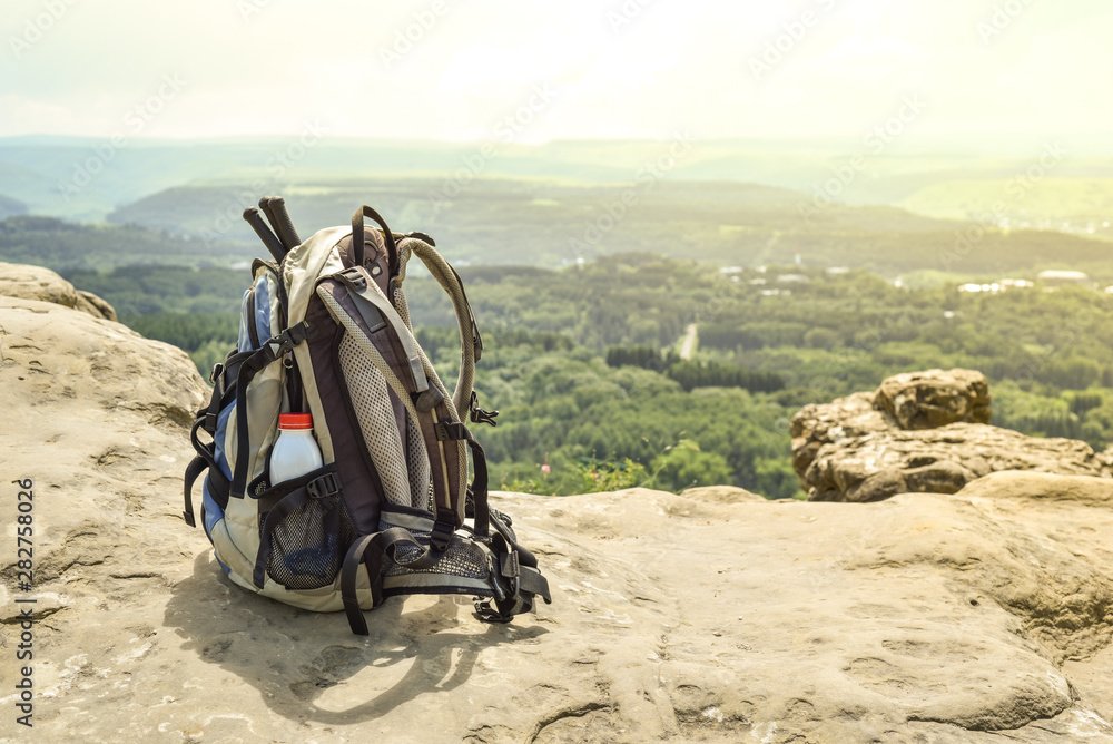 Hipster hiker tourist backpack on background nature in mountain, blurred panoramic landscape, traveler relax holiday concept, view planning wayroad in trip vacation, travel adventure. Hipster hiker tourist backpack on background nature in mountain, blurred panoramic landscape, traveler relax holiday concept, view planning wayroad in trip vacation, travel adventure.
