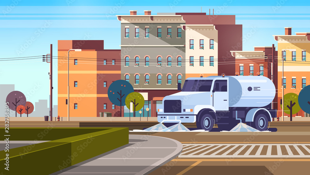 Φωτογραφία street sweeper truck on crossroad washing asphalt with water industrial vehicle