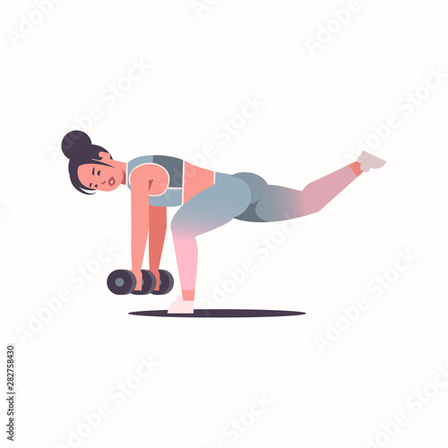 sporty girl doing stretching exercises with dumbbells attractive excited sportswoman in sportswear training workout healthy lifestyle fitness concept flat full length white background