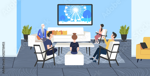 businesspeoplesitting on chairs and sofa watching famous landmarks tv travel show concept ferris wheel silhouette on television modern office interior flat full length horizontal