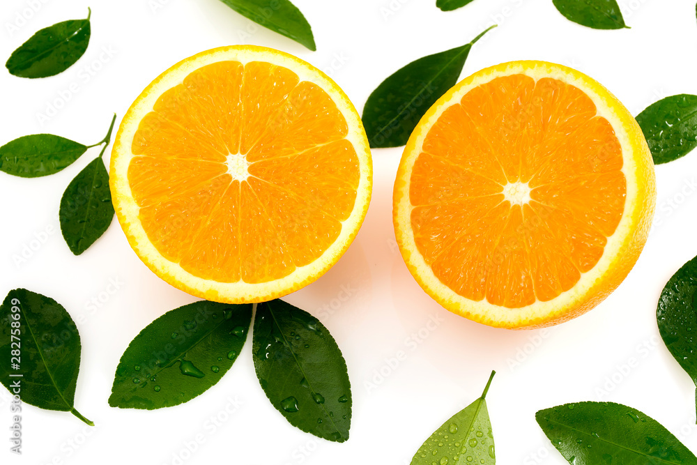 Citrus is a fruit that has high vitamin C, half cut orange, has a shadow and has leaves on a white background. Citrus is a fruit that has high vitamin C, half cut orange, has a shadow and has leaves on a white background.