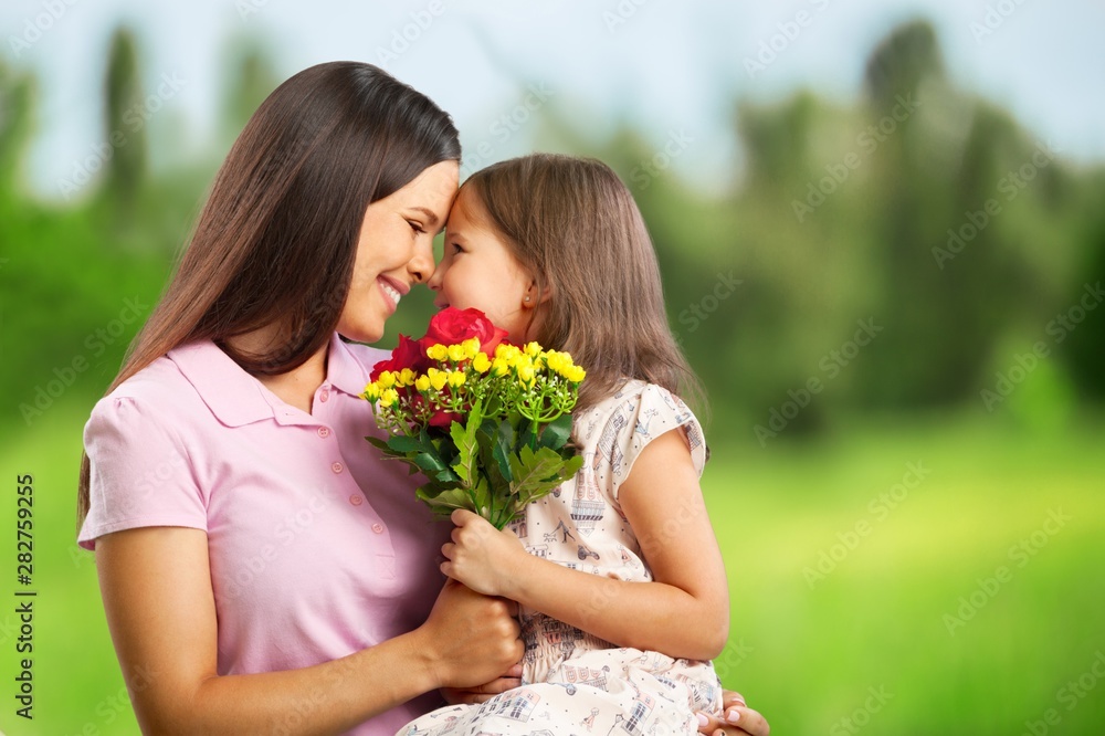 Happy Mother and daughter hugging Happy Mother and daughter hugging
