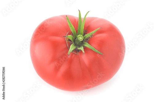 red tomato with green little leaves on isolated white background