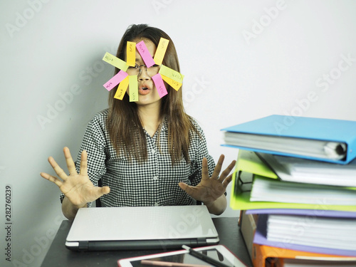 funny overworked businesses women working in office action reacts when the boss orders her too much