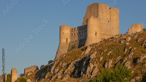 Medieval Castle in the Italian mountains photo