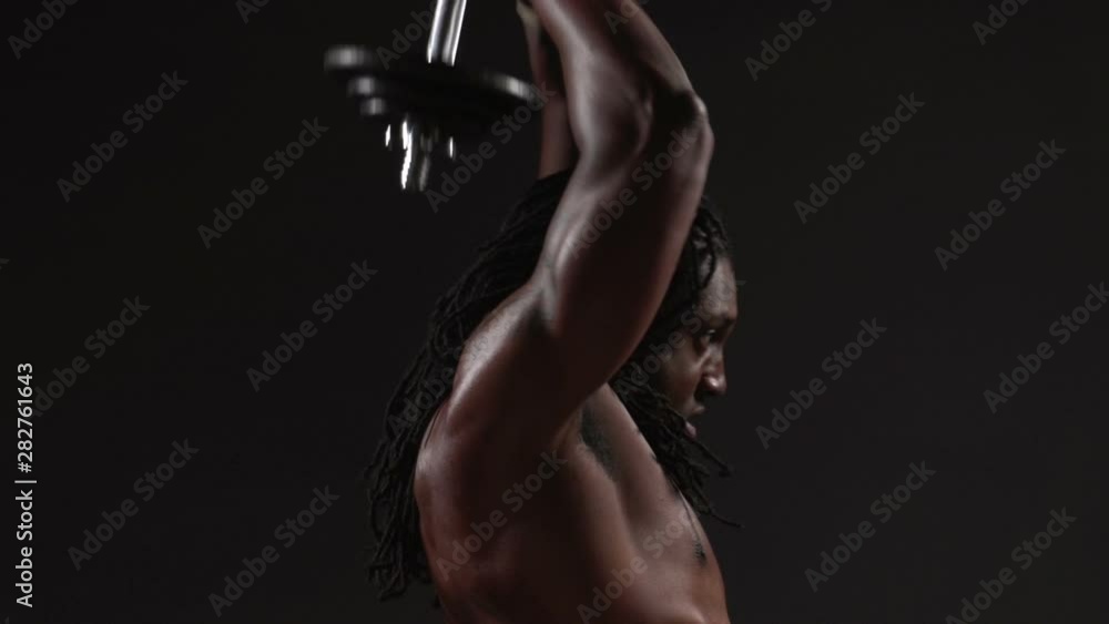 Weightlifting, slow motion shot of fit African American Man Weightlifting, slow motion shot of fit African American Man