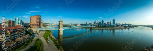 Fototapeta Naklejka Na Ścianę i Meble -  Panoramic view of Cincinnati downtown with the historic Roebling suspension bridge over the Ohio river