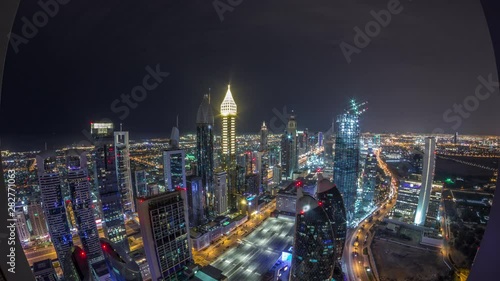 Wallpaper Mural Panoramic skyline of the buildings near Sheikh Zayed Road and DIFC aerial night timelapse in Dubai, UAE. Modern towers and illuminated skyscrapers in financial center and downtown Torontodigital.ca