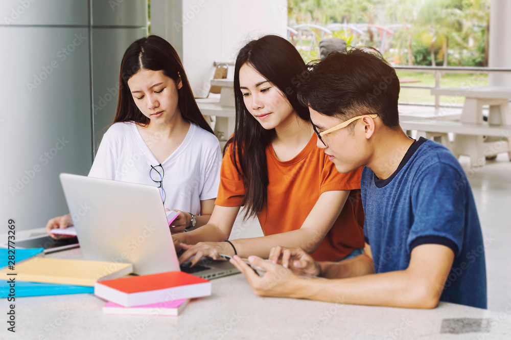 Group of young asian studying in university sitting during lecture education students college university studying . Group of young asian studying in university sitting during lecture education students college university studying .