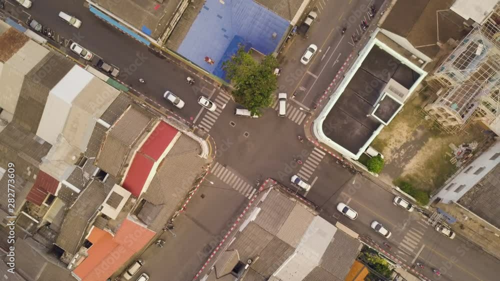 Drone shot of crossroad full of vehicles in Phuket Drone shot of crossroad full of vehicles in Phuket