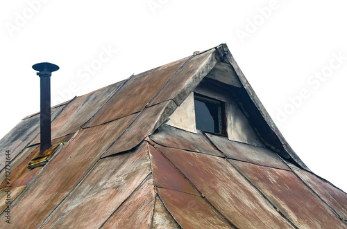 Aged Cottage Details: Roof Ridge, Gable End with Little Window, Rusty Metal Roof Sheets, Metal Pipe Chimney with a Cap. Steampunk Style Concept.