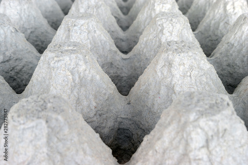 Underside of an Empty Biodegradable Molded Pulp Fiber Egg Carton Tray. photo