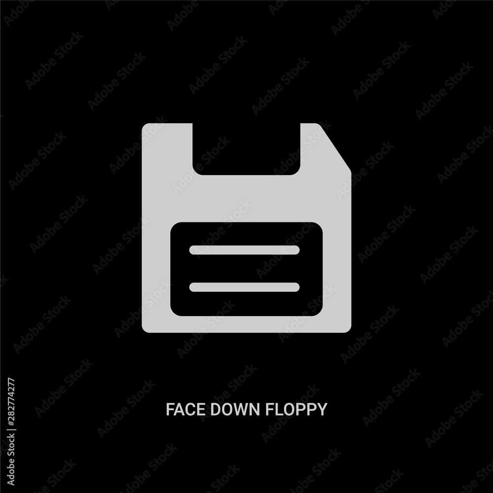 white face down floppy disk vector icon on black background. modern flat face down floppy disk from tools and utensils concept vector sign symbol can be use for web, mobile and logo.