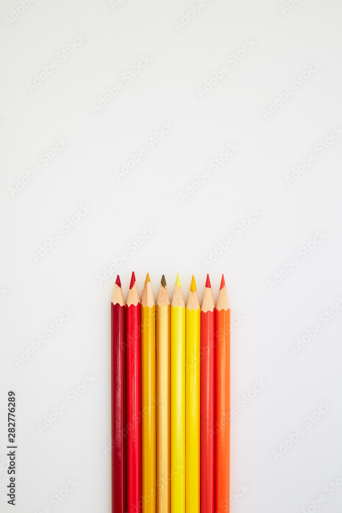Red and Yellow Color pencils on white Red and Yellow Color pencils on white