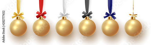 Set of Christmas decorative balls on ribbon with bow, golden color. Xmas bauble