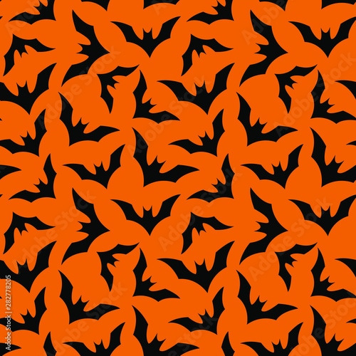 Vector seamless Halloween pattern with bats on orange background. Simple halloween design for gift box, greeting card, wallpaper, web design.