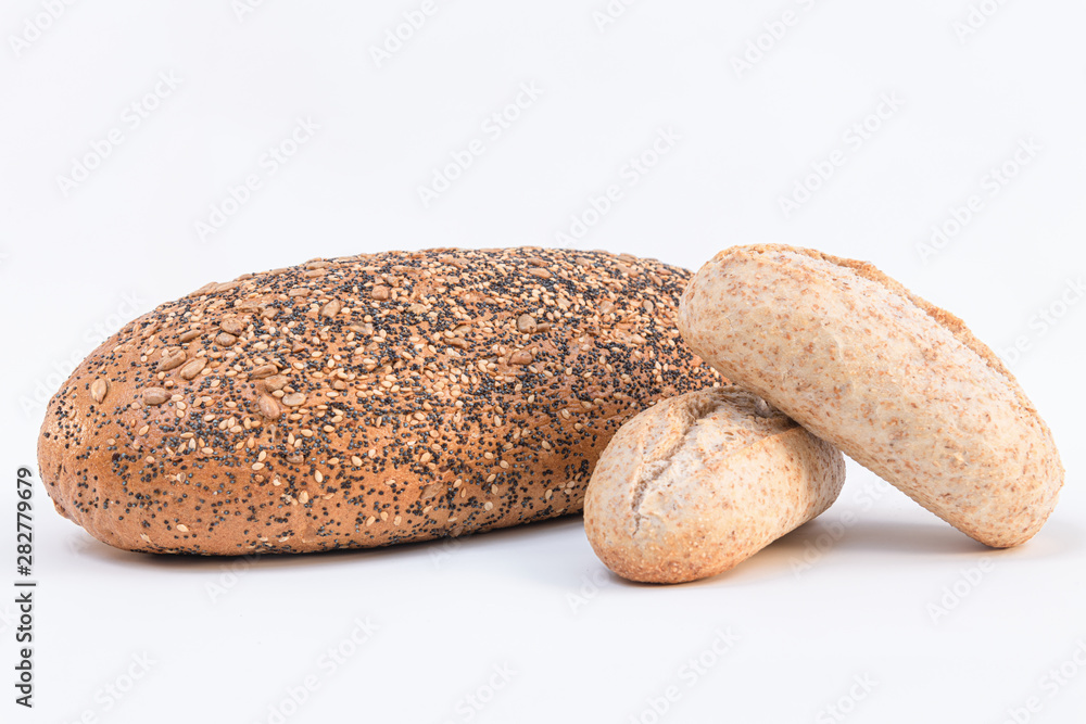 Two different loaf of multi grain bread on a white background Two different loaf of multi grain bread on a white background
