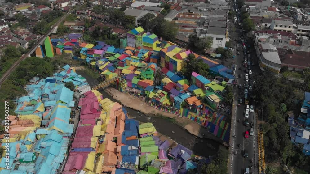 Aerial video clip of Kampung Warna Warni Jodipan, or colorful village, a famous tourist destination located in Malang, East Java, Indonesia. Aerial video clip of Kampung Warna Warni Jodipan, or colorful village, a famous tourist destination located in Malang, East Java, Indonesia.