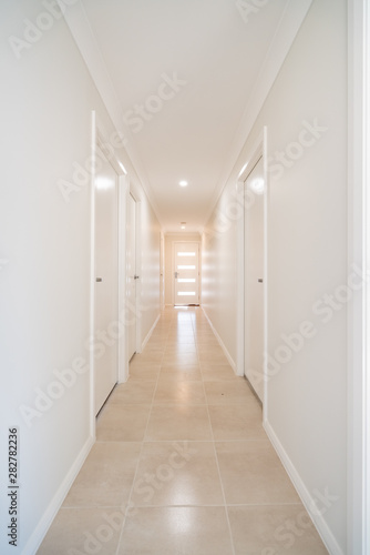 Hallway of an Australian residential house home tiled entrance © camstockphotos