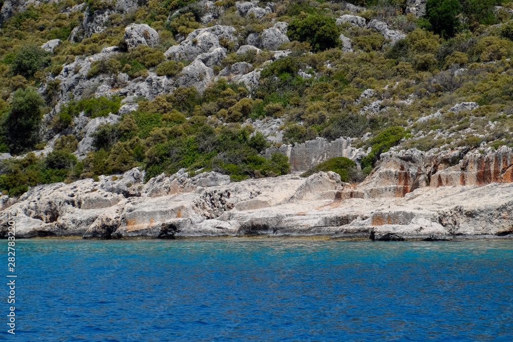 ruins of the ancient city of Kekova on the shore.