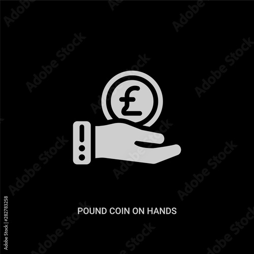 white pound coin on hands vector icon on black background. modern flat pound coin on hands from business concept vector sign symbol can be use for web, mobile and logo.