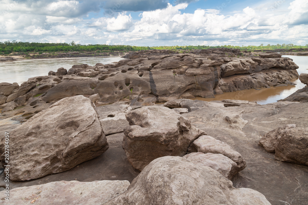 River Island. Rocks from water erosion. 