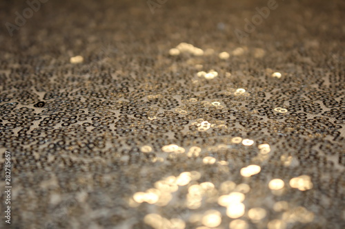 beautiful shiny background with bokeh and sequins